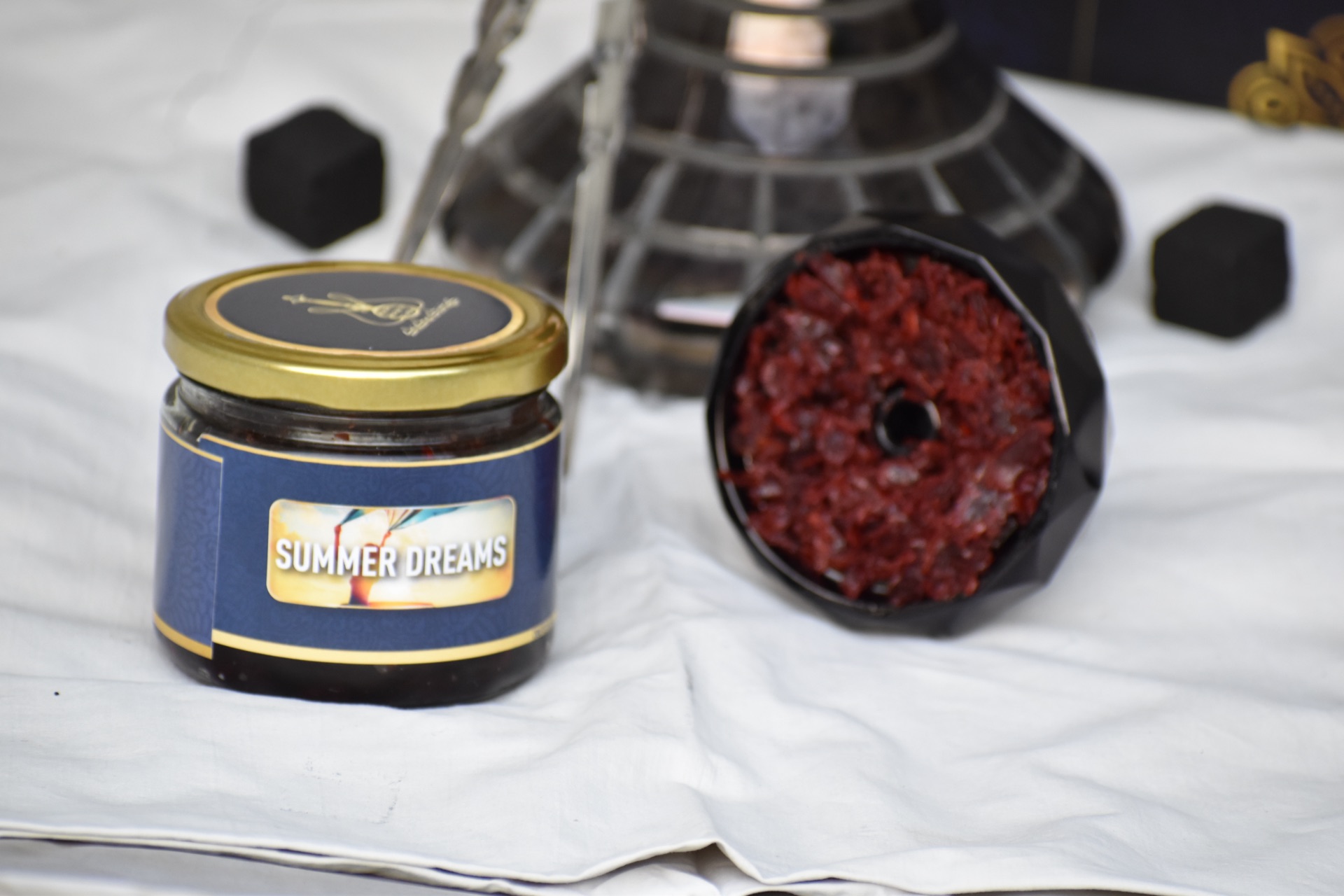 Shisha Stories — Summer Dreams jar with hookah on the studio set.