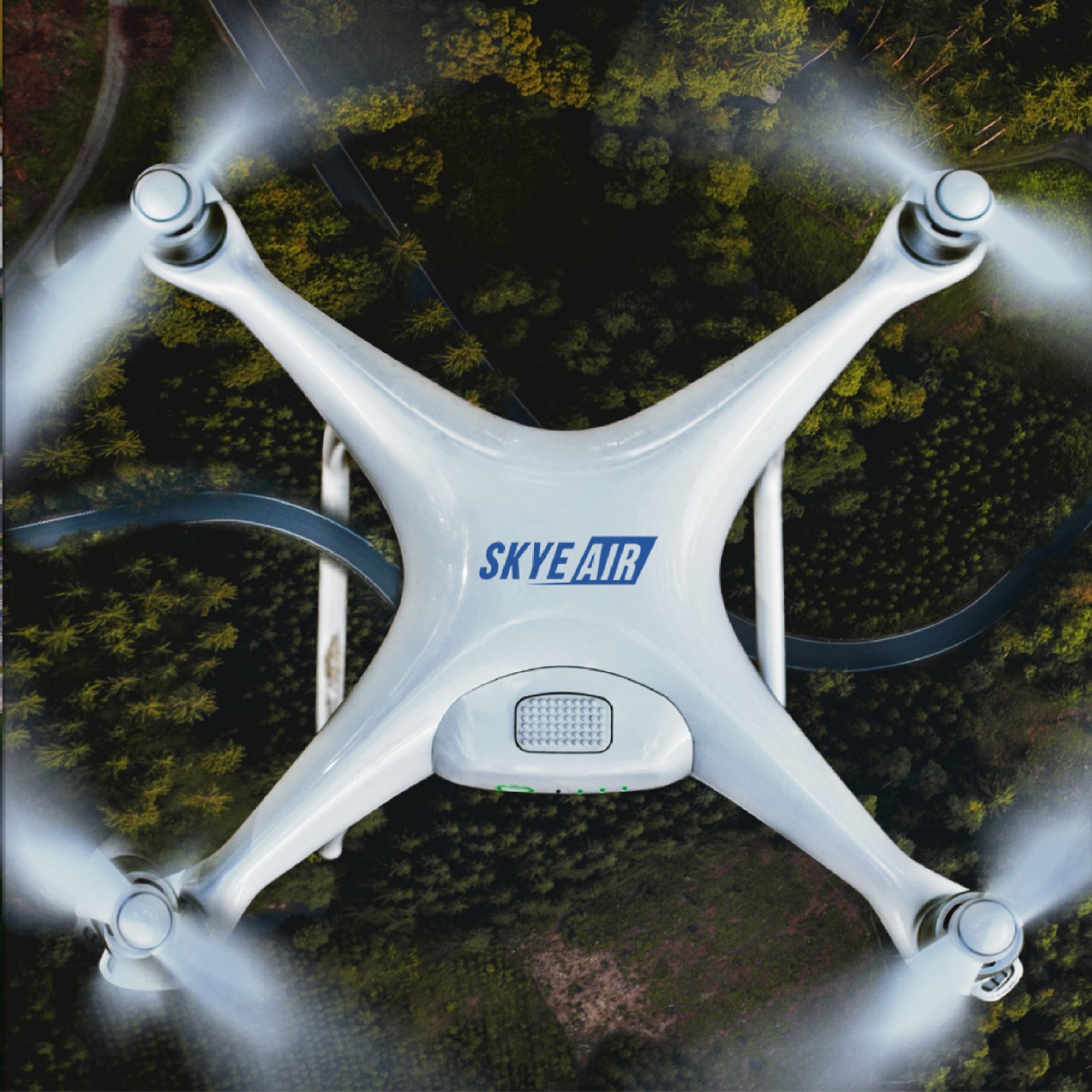 Skye Air — top-down aerial composition of branded drone above a forest road.