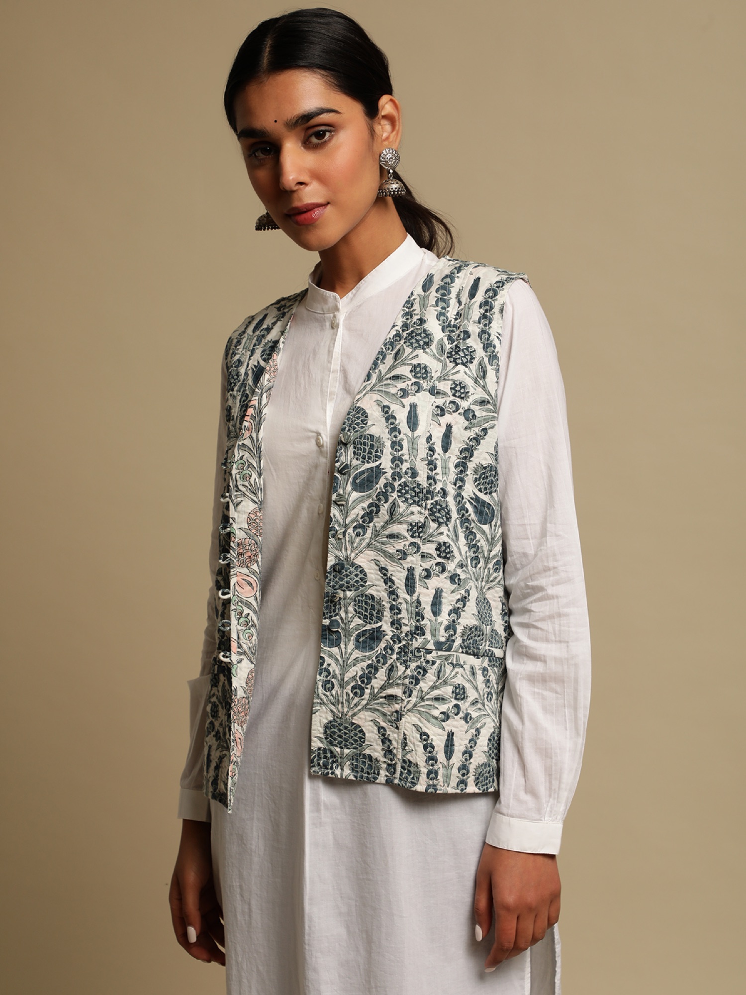 Yumi — Anaar Jacket portrait, half-body.