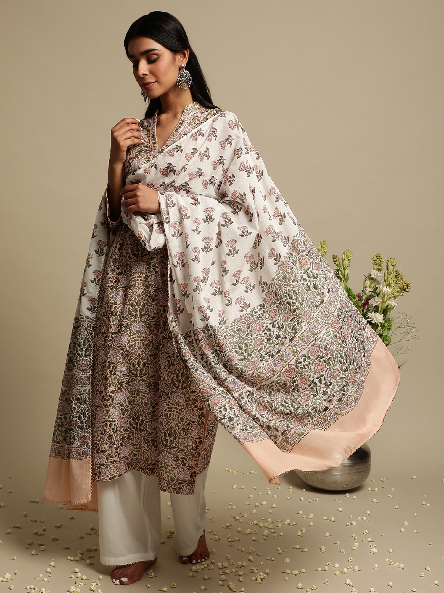 Yumi — Pink Rose Jaal kurta detail with floral styling.